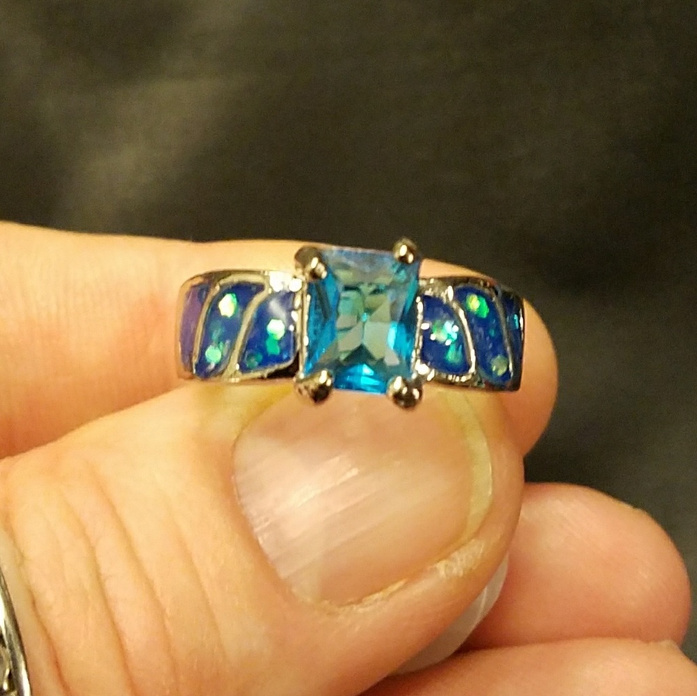 Emerald cut blue opal ring